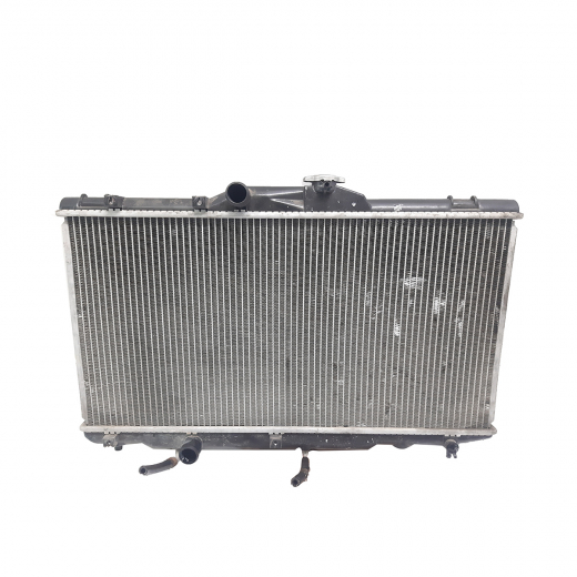 Радиатор охлаждения Toyota Trueno/ Levin / Marino / Ceres / Carib / Sprinter / Corolla '91-'00 (5A-FE, 4A-FE, 4A-GE, 7A-FE, 4E-FE, 3E, 5E-FE, 2E) AT без вентилятора контрактный