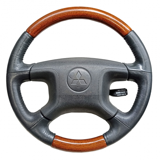 Руль Mitsubishi Montero '00-'06/ Pajero '99-'07 Airbag (4 луча, под дерево, кожа) контрактный