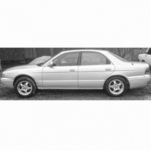 Дверь передняя левая Mazda Capella Sedan '94-'97 контрактная