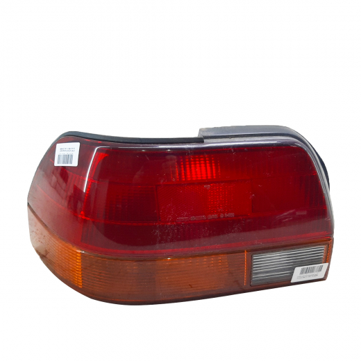 Стоп сигнал Toyota Corolla Sedan '95-'97 левый (12-413) контрактный