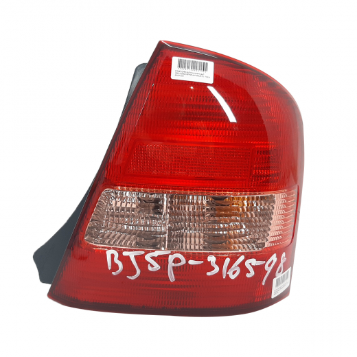 Стоп сигнал Mazda Familia '00-'03 правый розовый (220-61866) контрактный