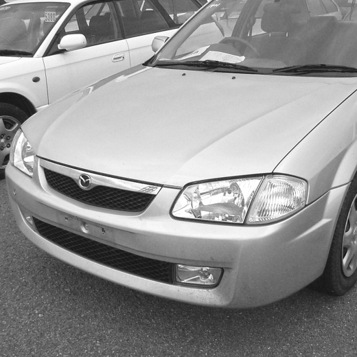Решетка радиатора Mazda Familia/ 323/ Astina/ Protege '98-'00 контрактная