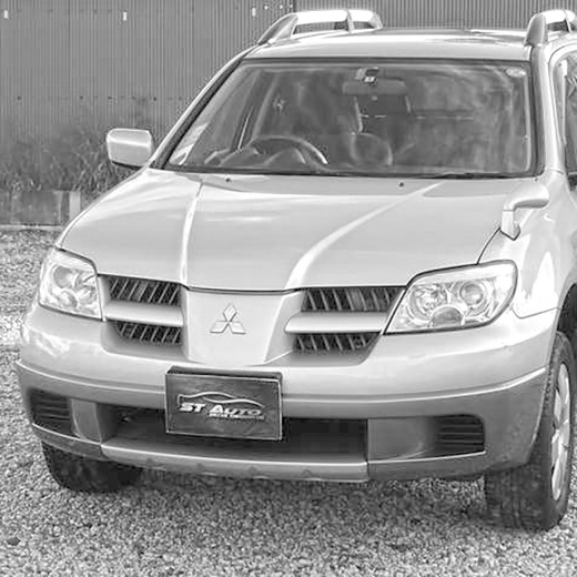 Решетка радиатора Mitsubishi Outlander/ Airtrek Sport gear '03-'05 левая контрактная