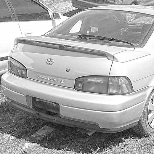 Бампер задний Toyota Cynos '91-'95 контрактный