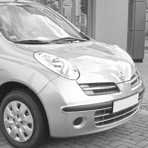 Бампер передний Nissan Micra '05-'10 под туманки (Китай)
